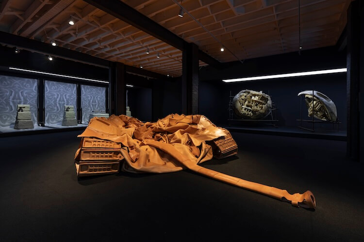 A deflated, flattened, full-scale replica of a T34 Soviet tank stitched from over 400 pieces of Italian leather.