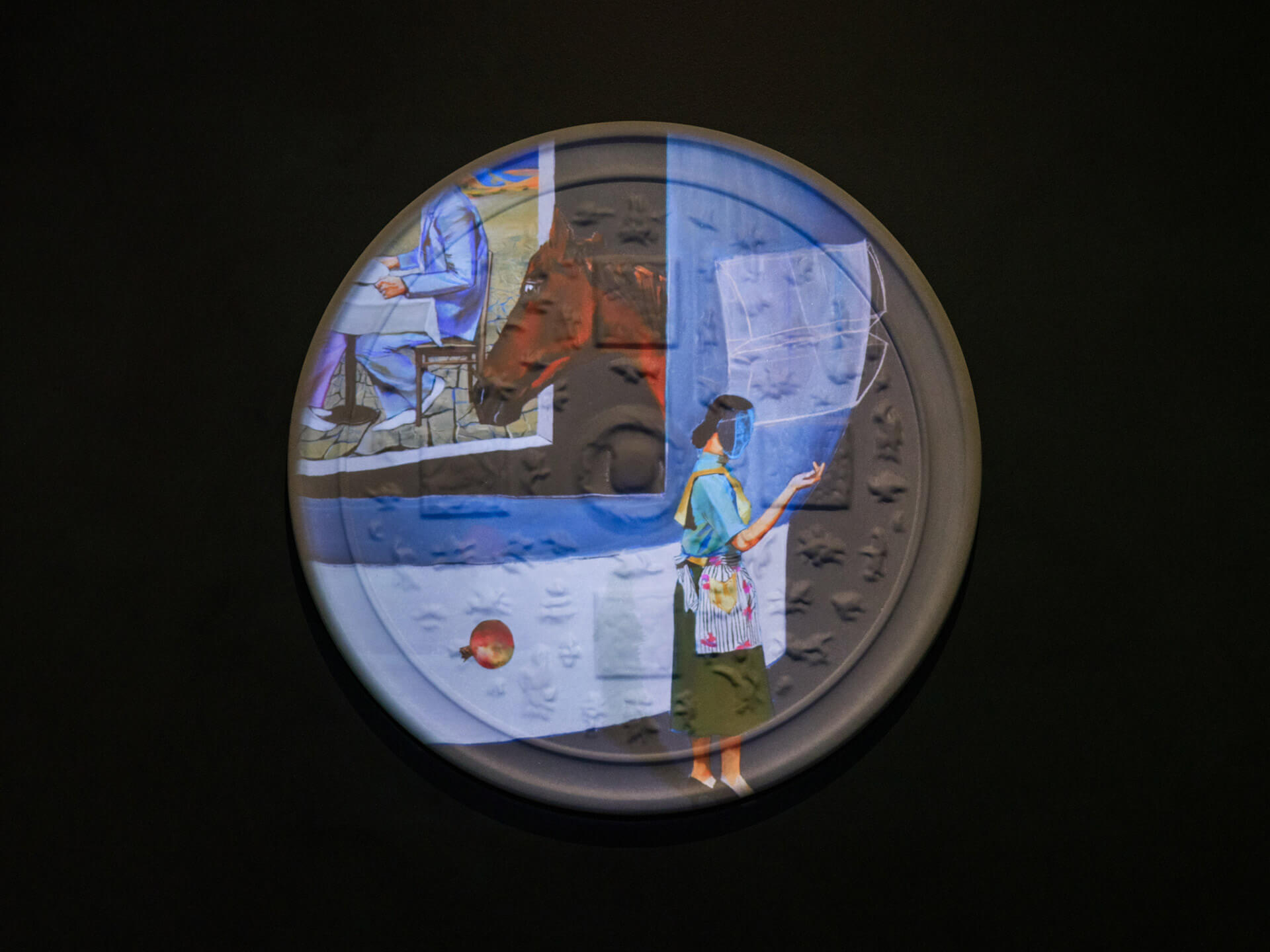 Circular video projection by Wang Haiyang showing "Double Fikret 3" with figures in domestic interior scene